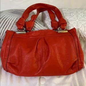 B. Makowsky Red handbag with silver hardware